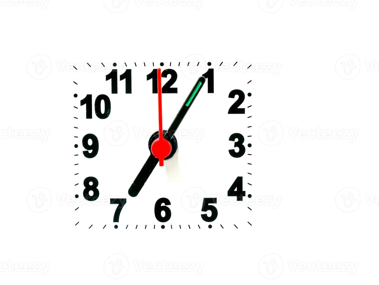 clock showing time on a white background photo
