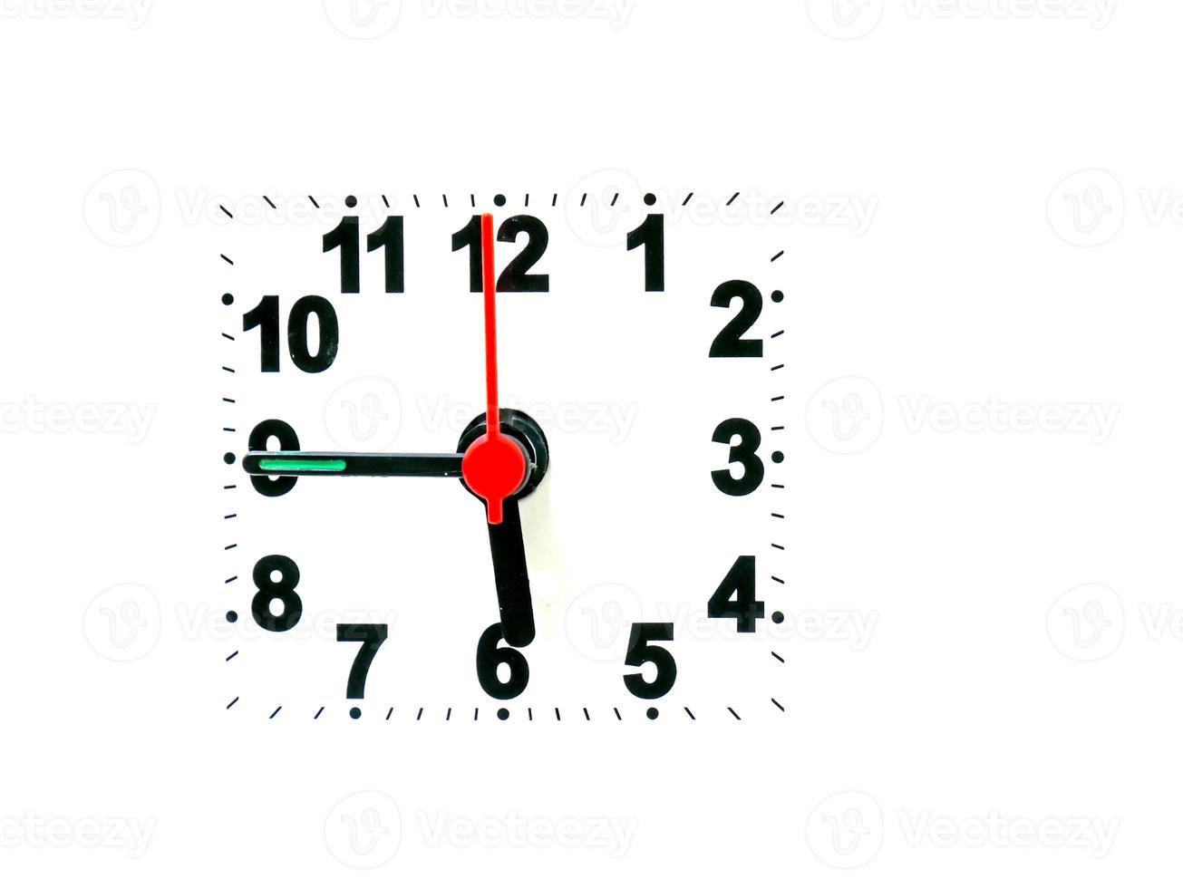 clock showing time on a white background photo