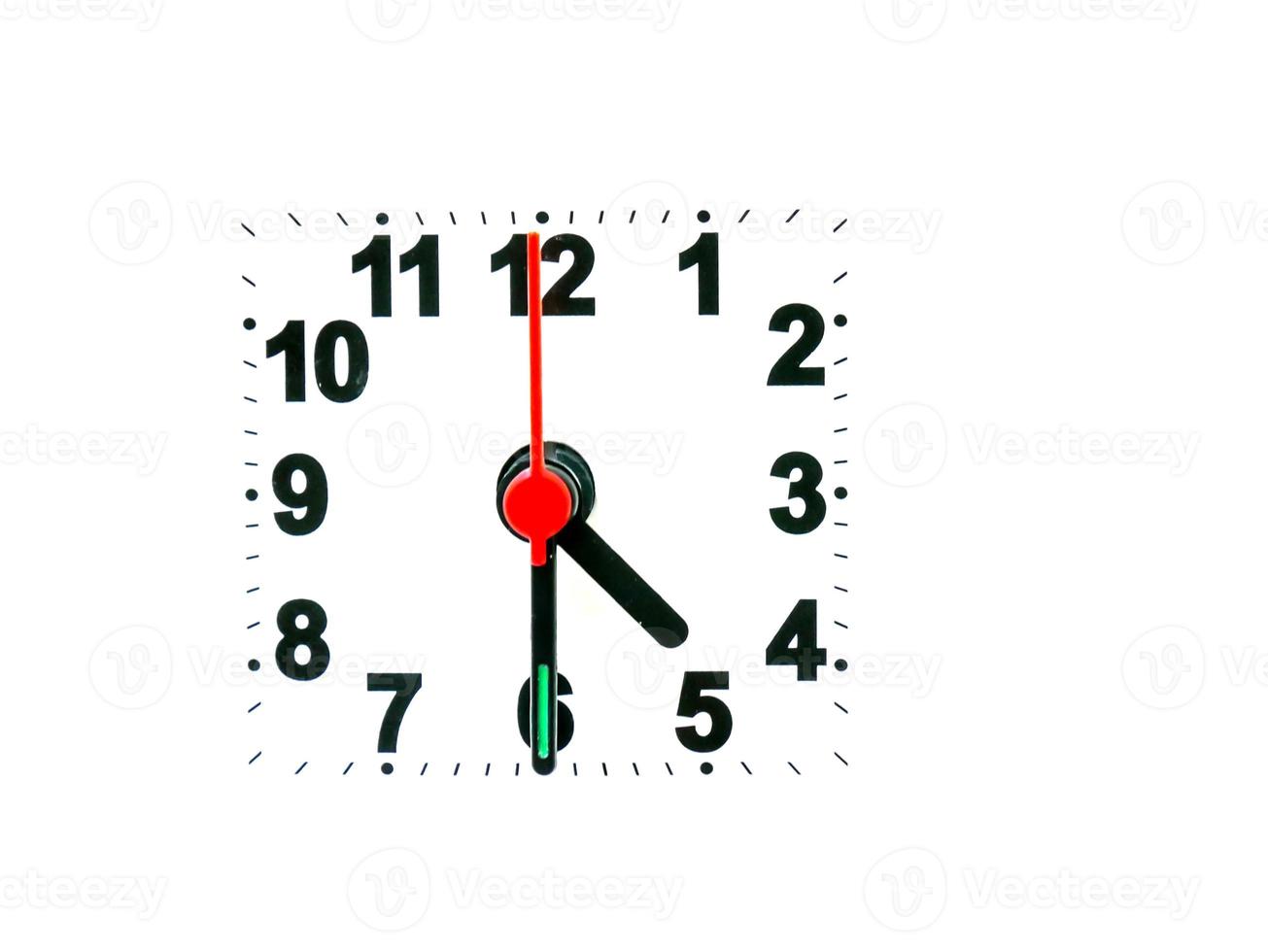 clock showing time on a white background photo