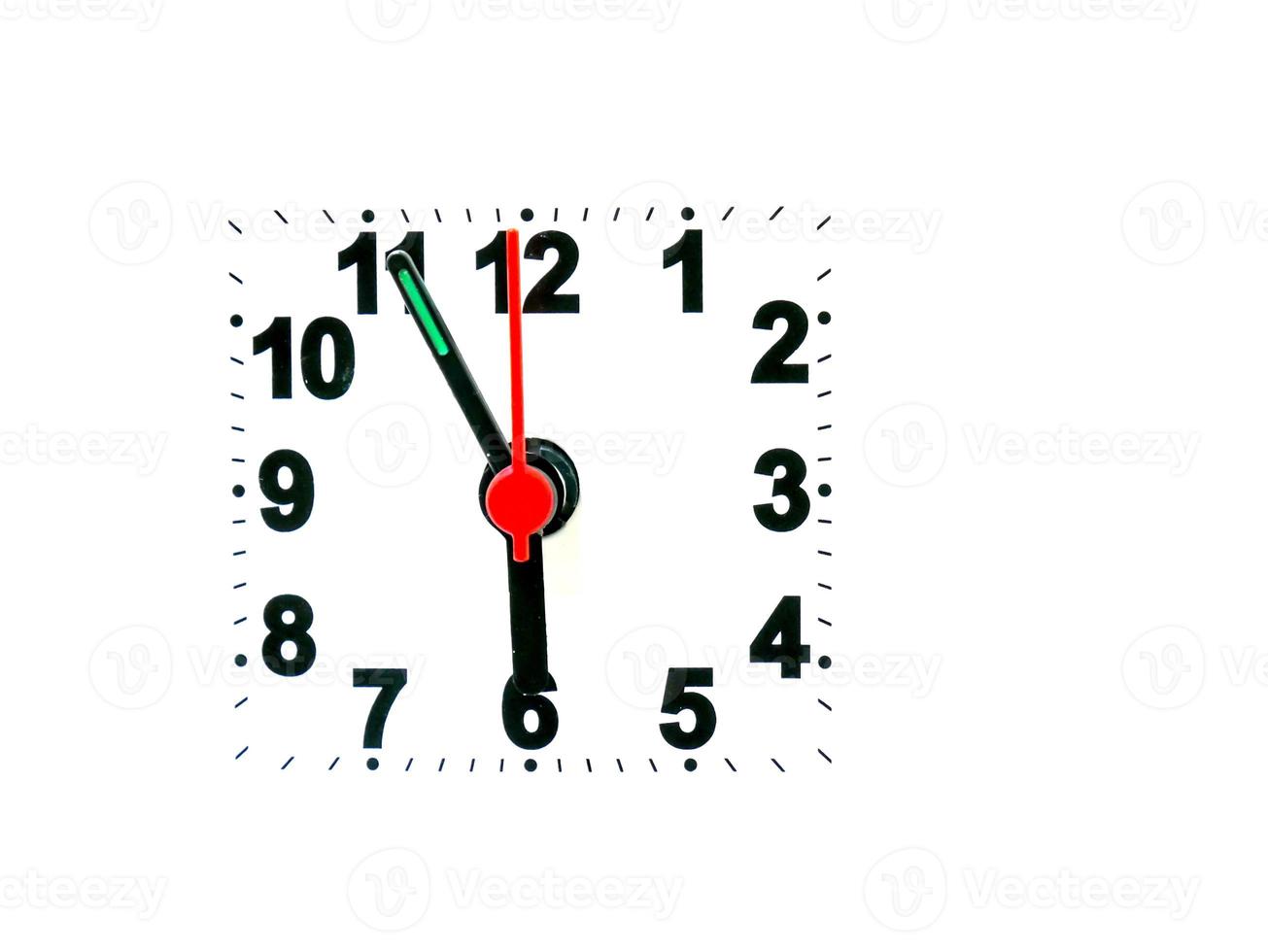 clock showing time on a white background photo