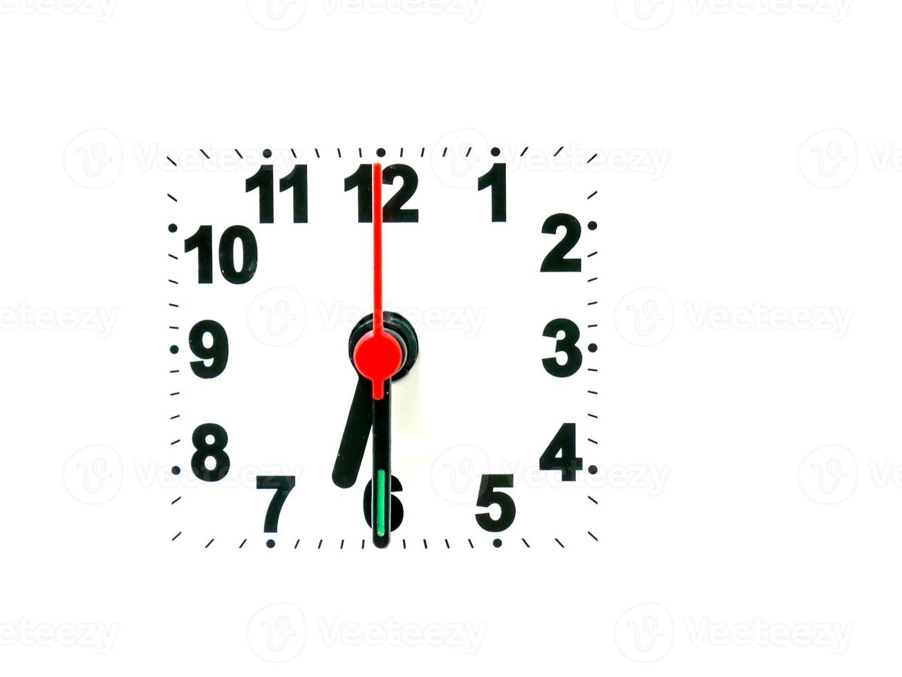 clock showing time on a white background photo