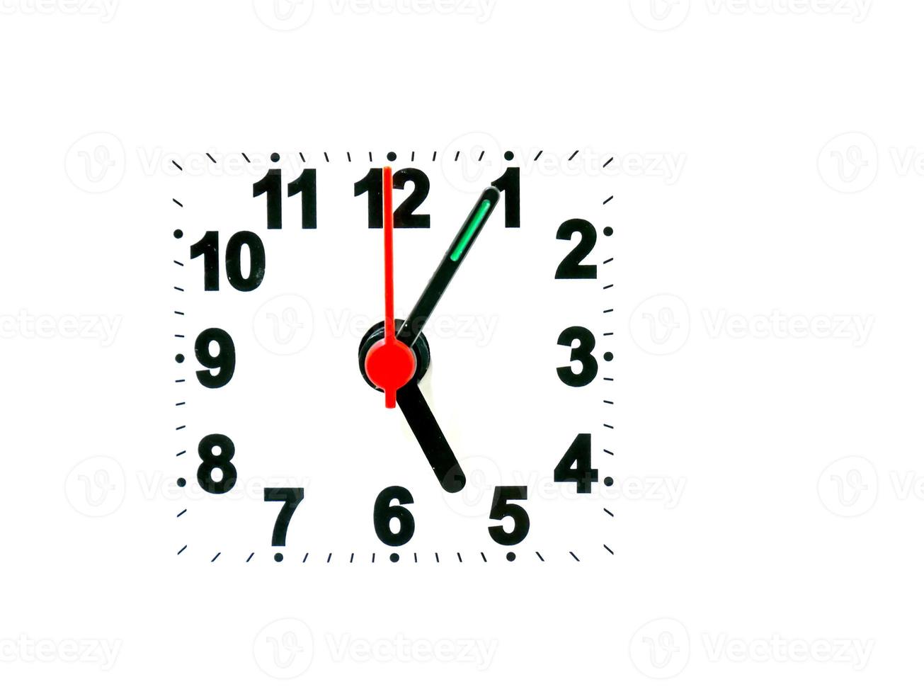clock showing time on a white background photo