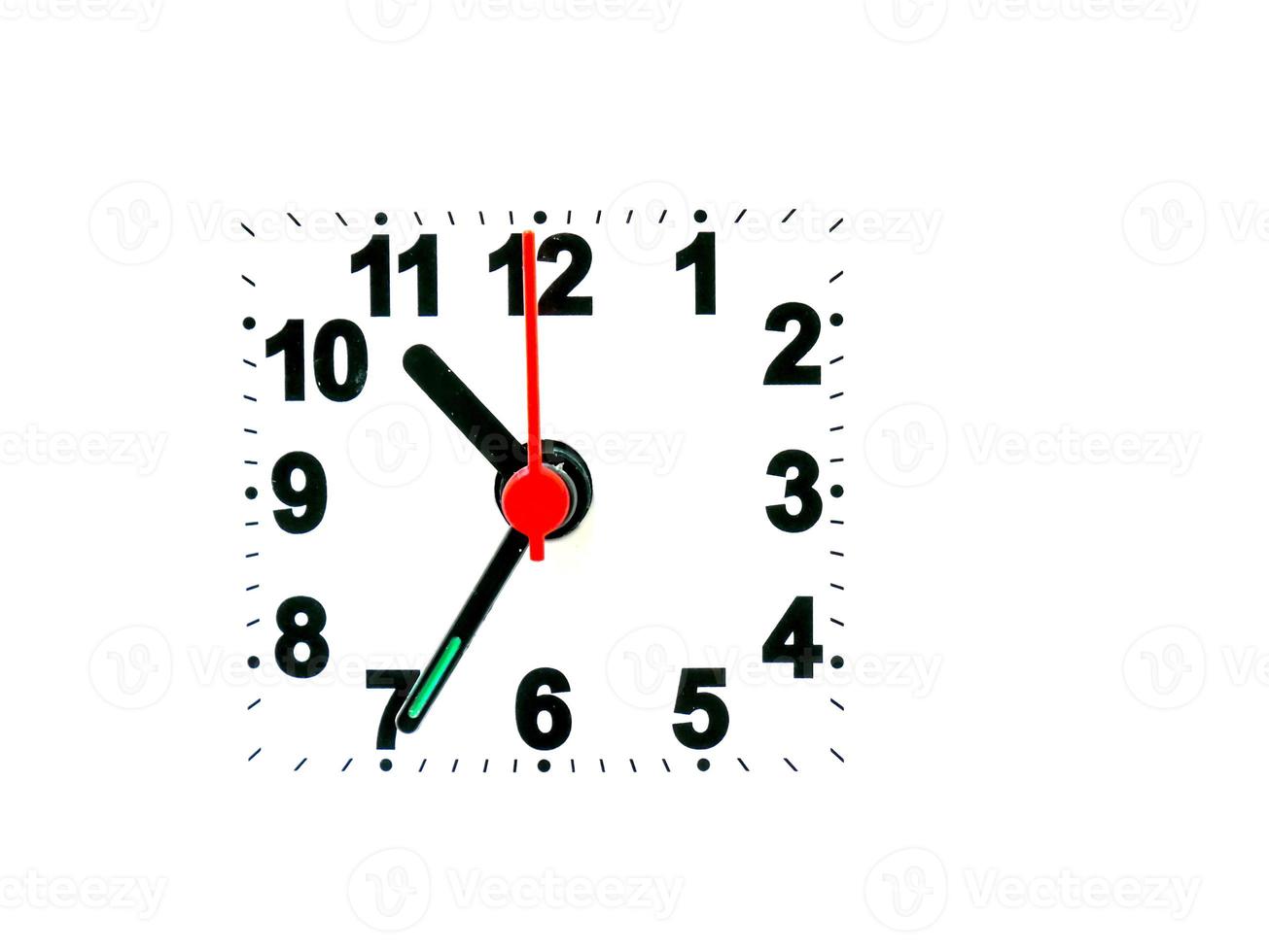 clock showing time on a white background photo