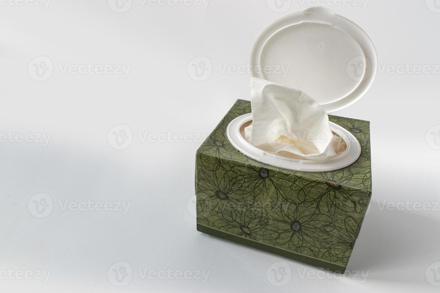 open tissue box on white background with copy space photo