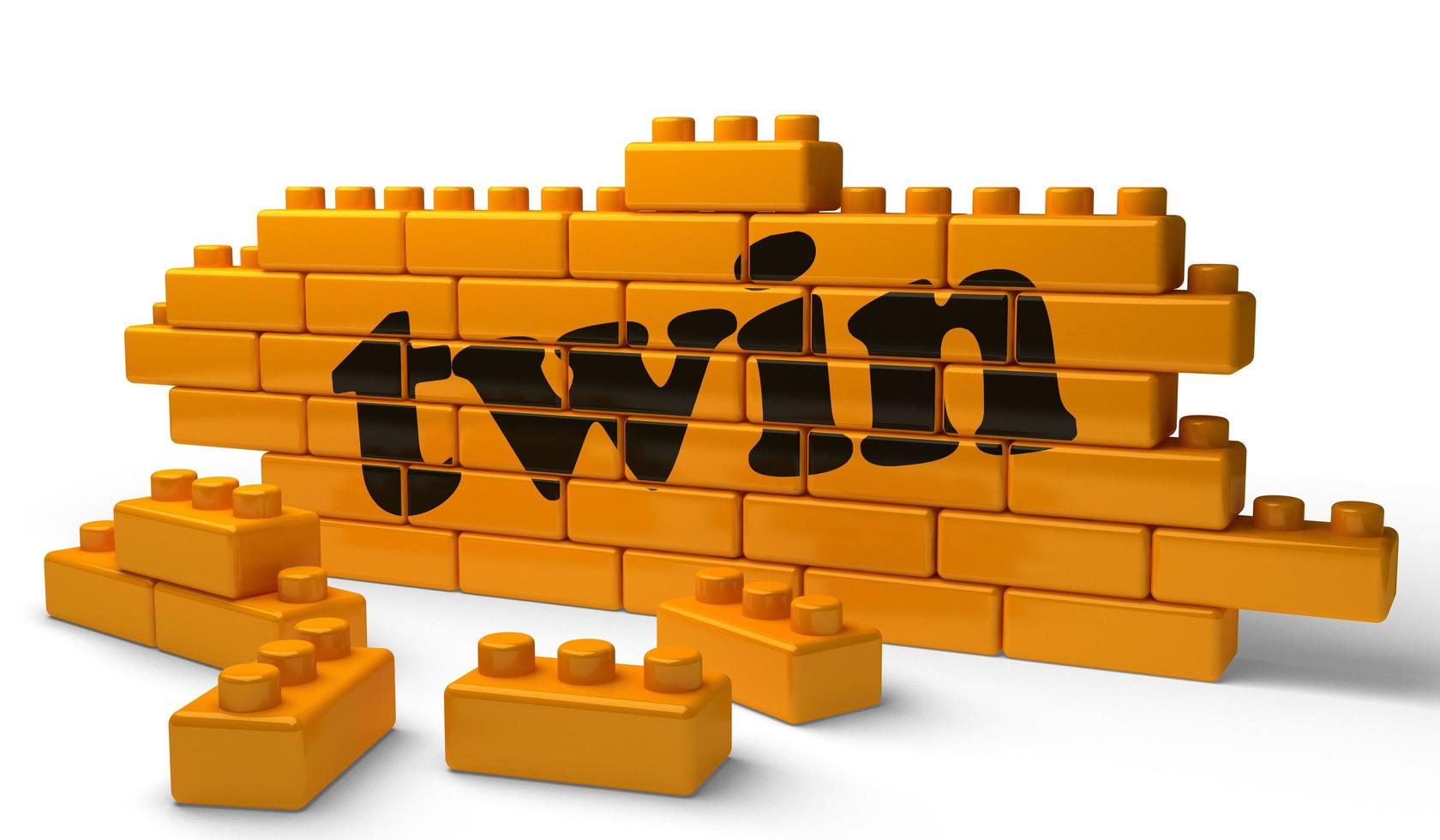 twin word on yellow brick wall photo