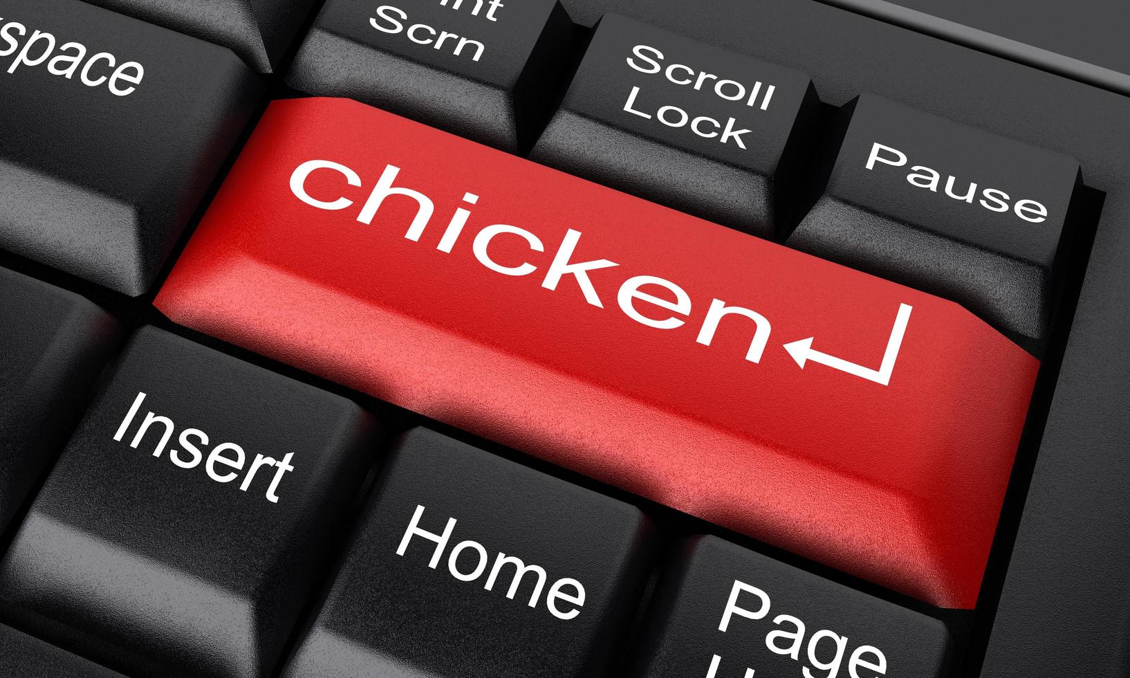 palabra de pollo en el botón rojo del teclado foto