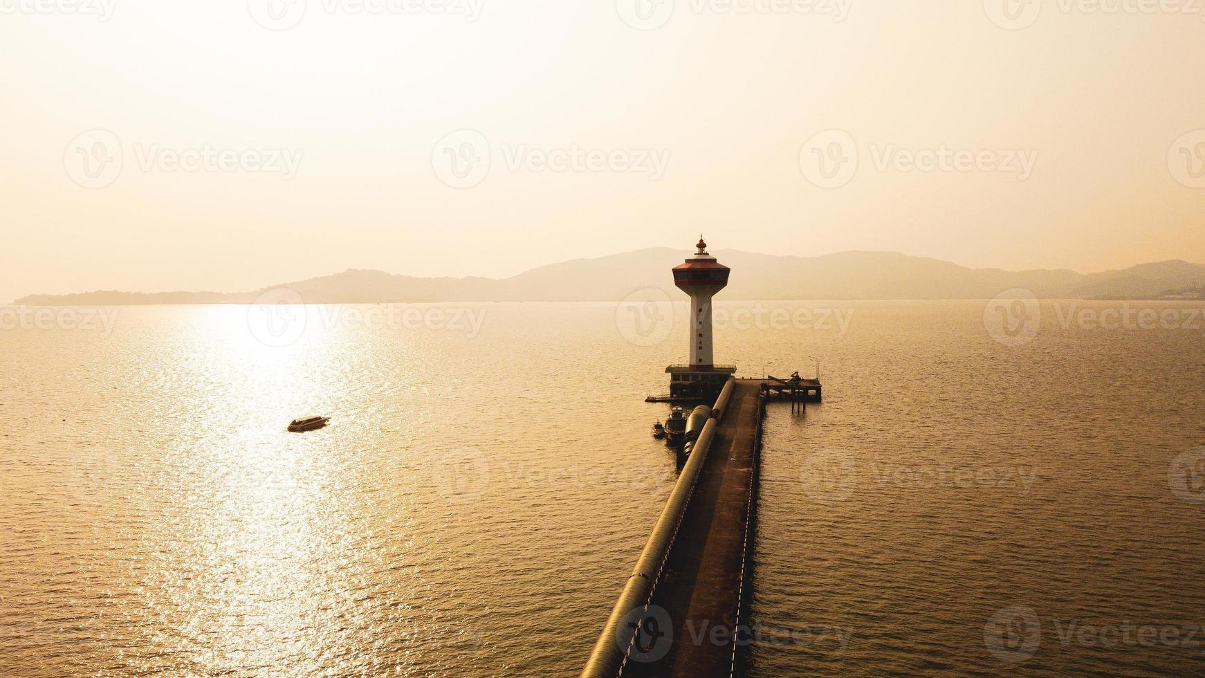 Blue lighthouse, sunset view. lighthouse sunset at afternoon view. Thailand photo