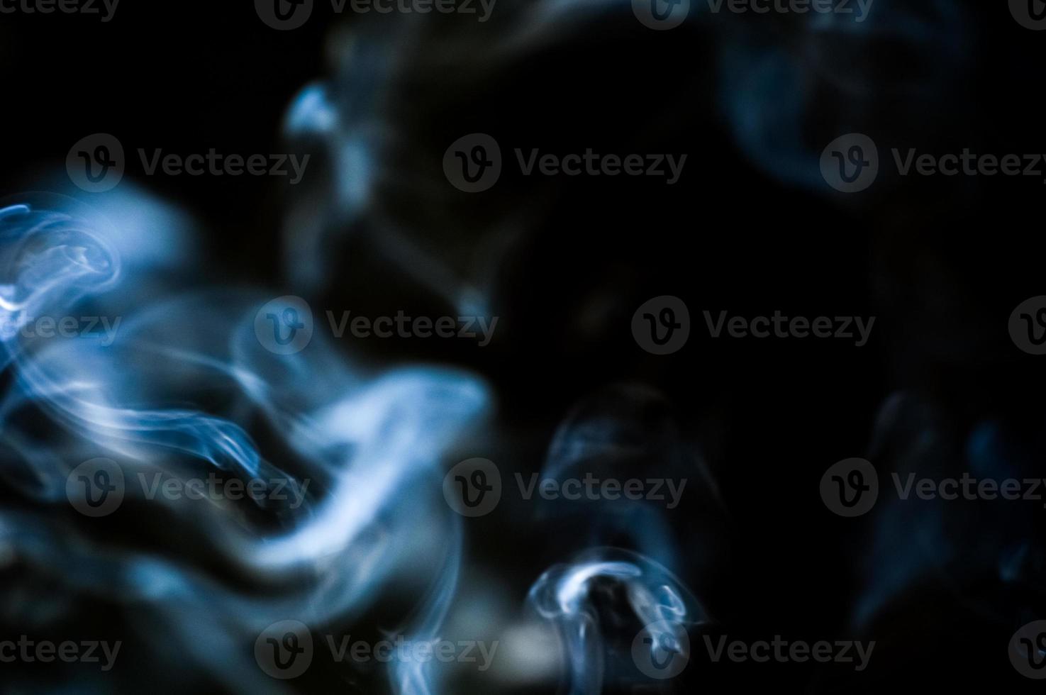 abstract background of smoke or fog on black background photo