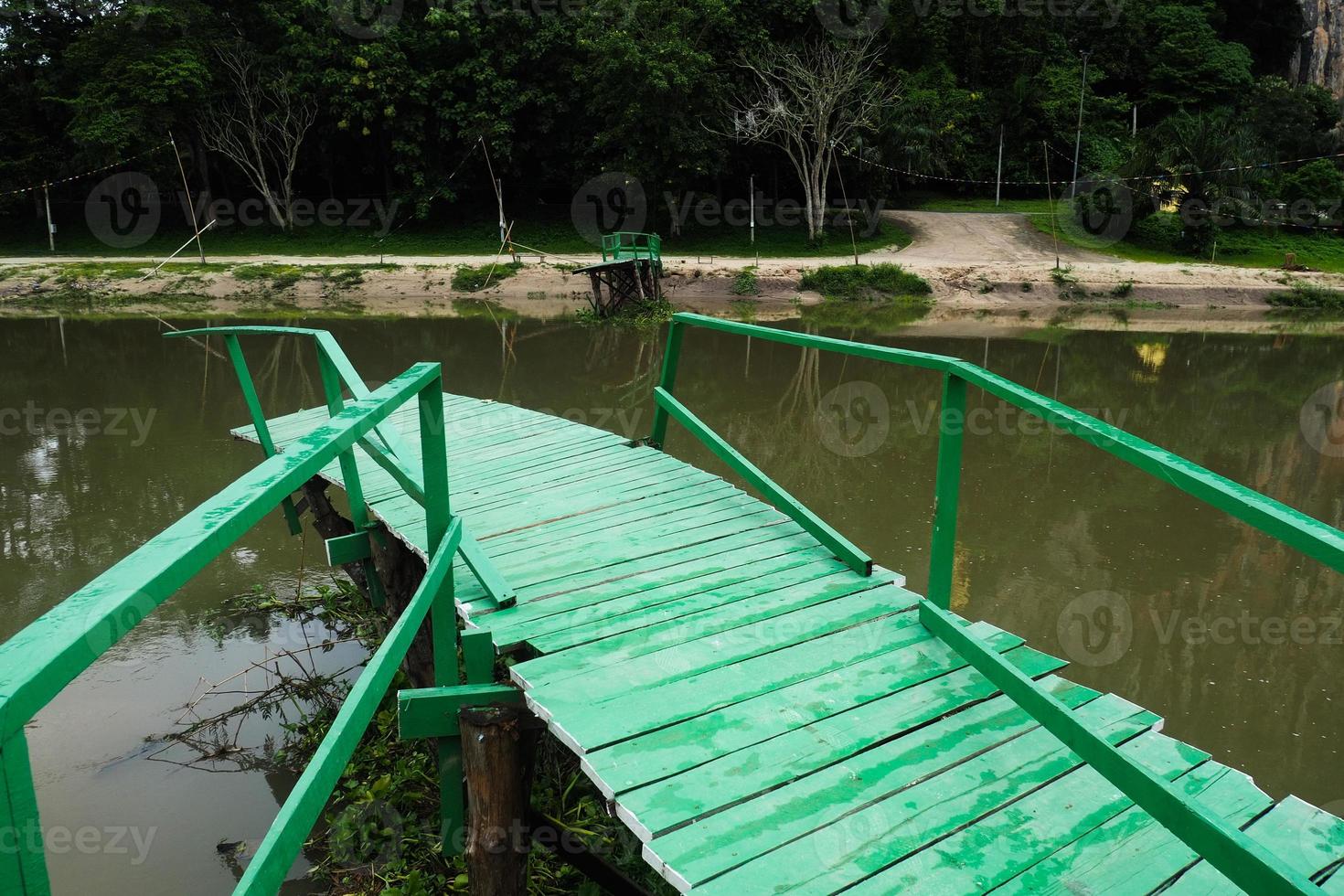 A wooden bridge that collapsed due to the violent flooding. photo