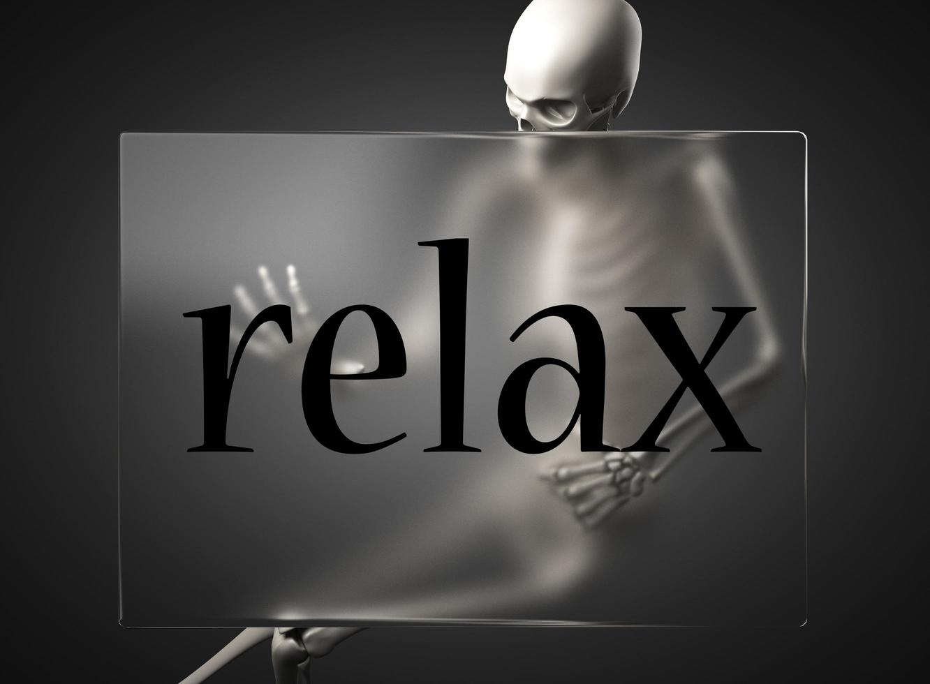 relax word on glass and skeleton photo