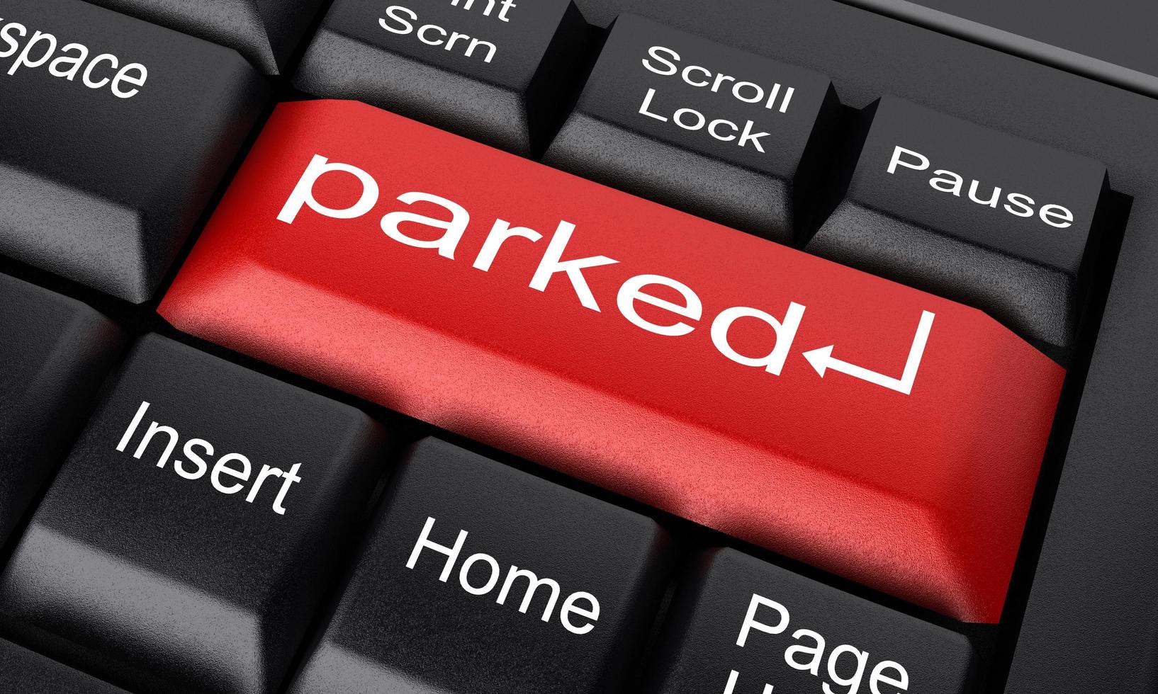 parked word on red keyboard button photo