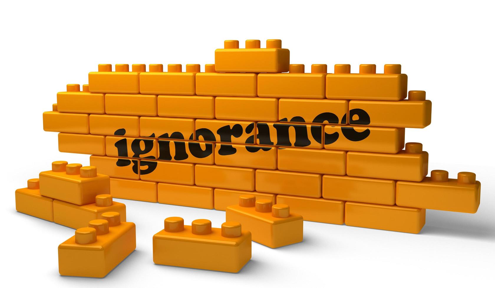 ignorance word on yellow brick wall photo