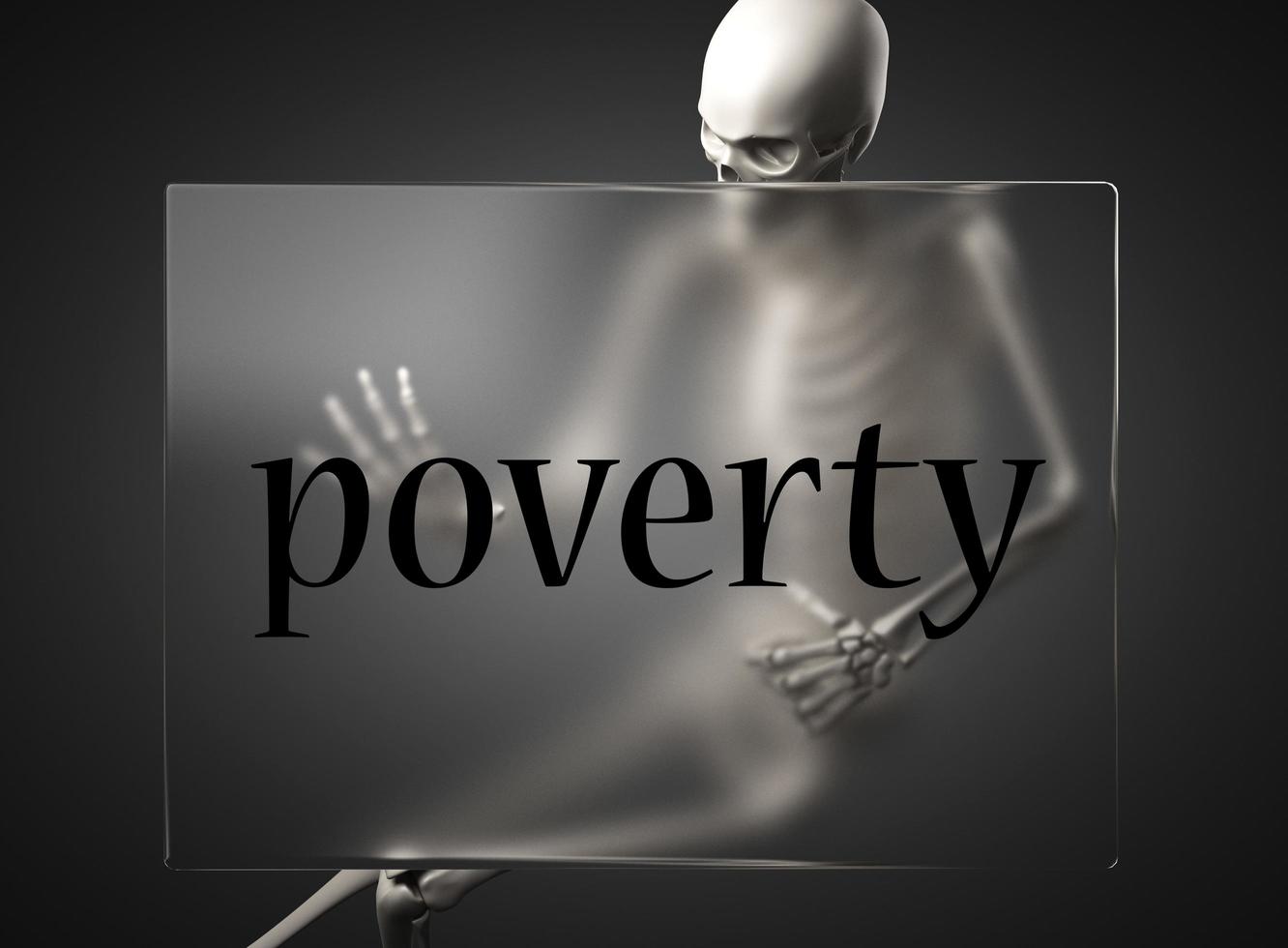 palabra de pobreza en vidrio y esqueleto foto