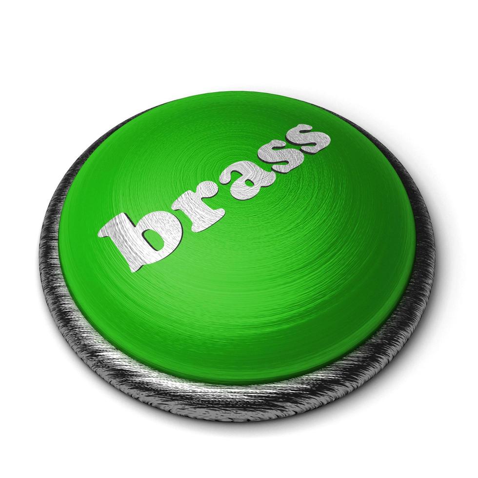 palabra de latón en el botón verde aislado en blanco foto