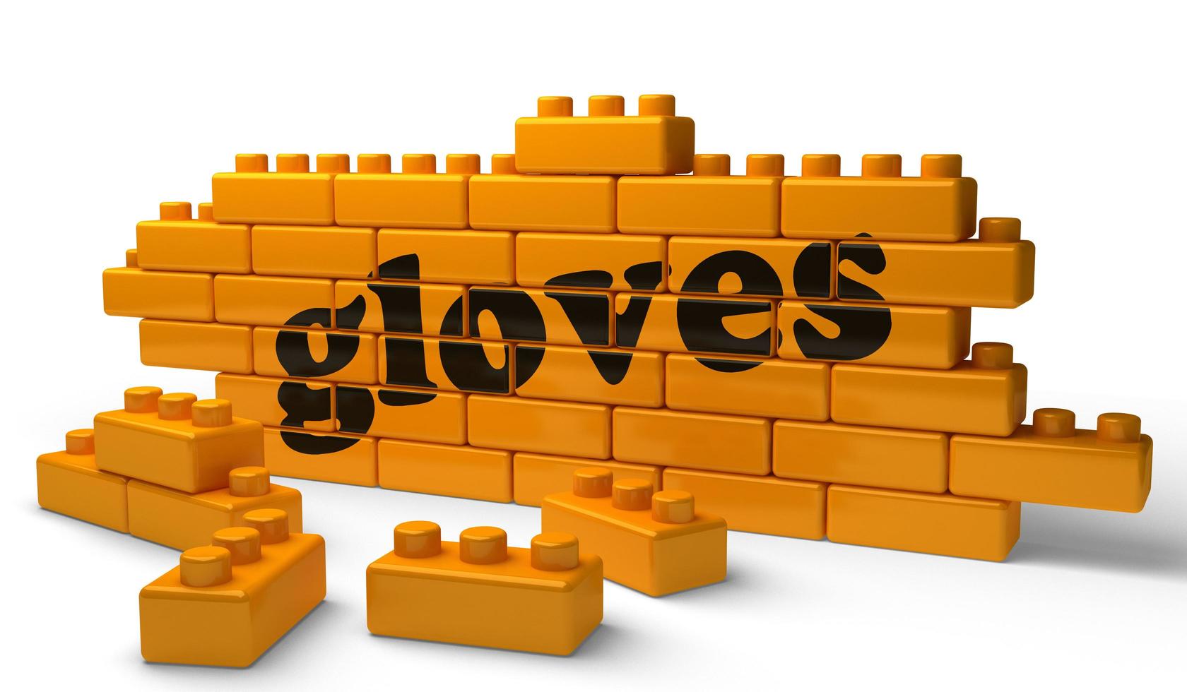 gloves word on yellow brick wall photo