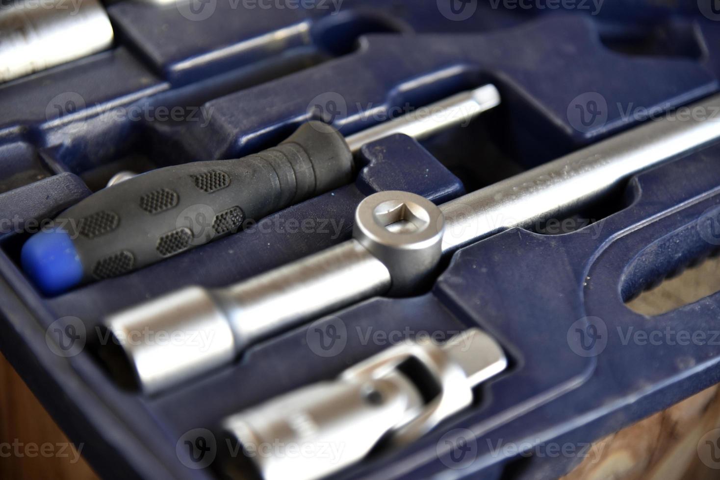 A set of iron keys with a head in a case photo