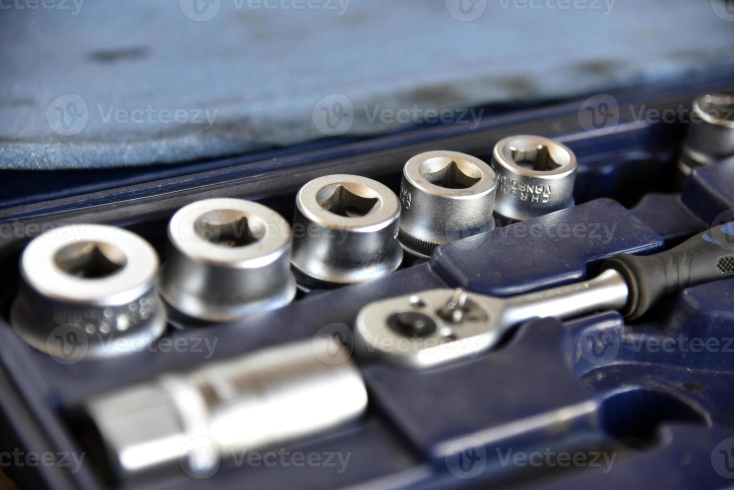 A set of iron keys with a head in a case photo