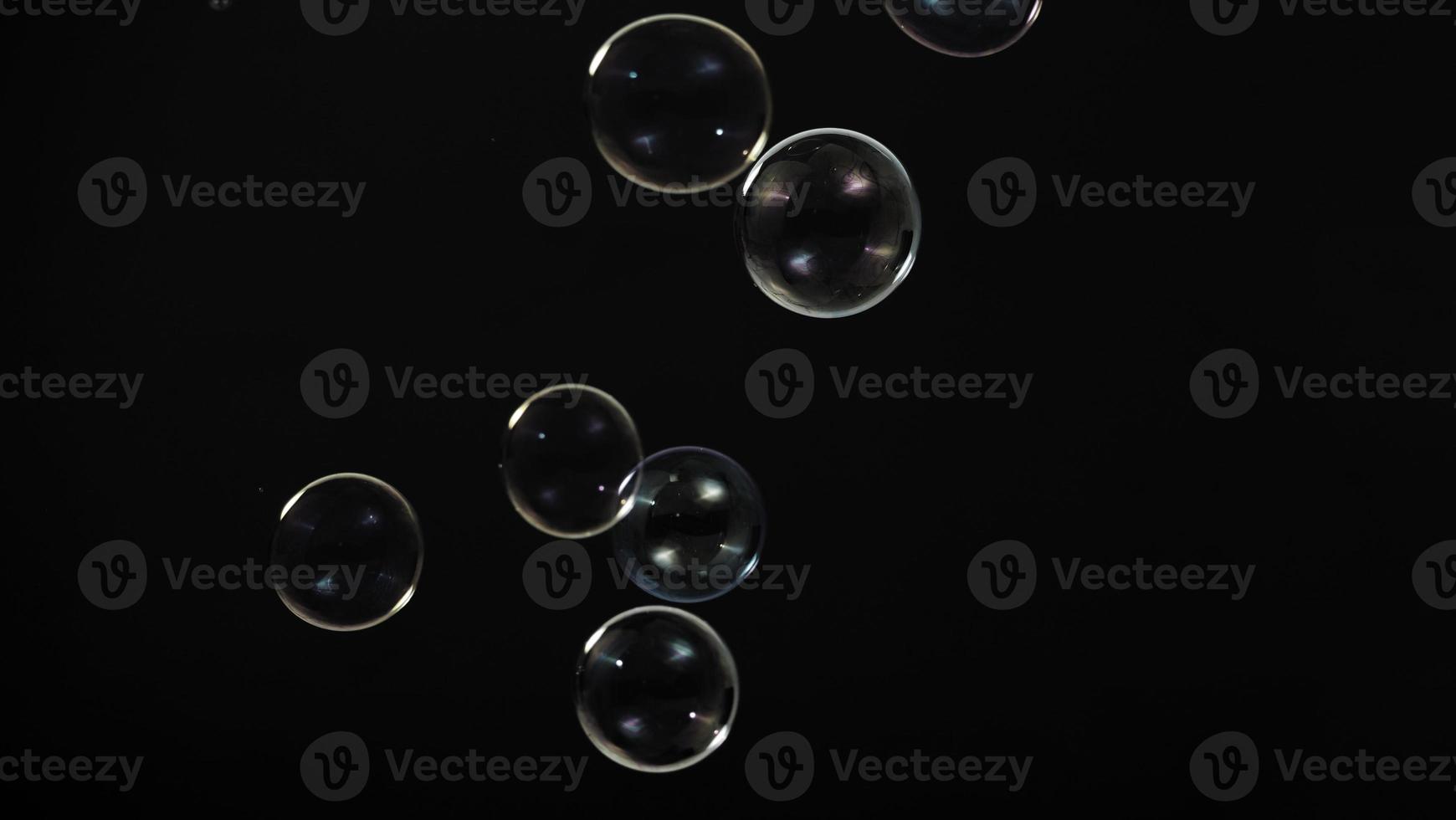 Soap bubble drop or Shampoo bubbles floating like flying in the air photo