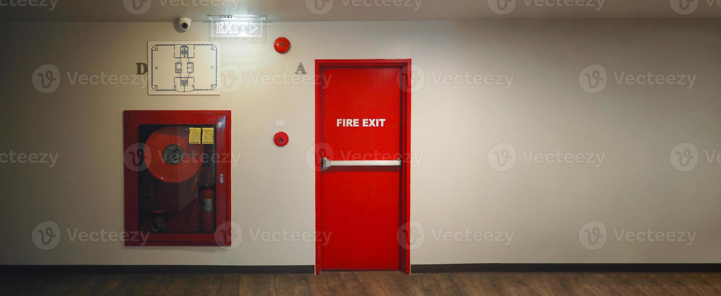 Fire exit door. Fire exit emergency door red color metal material photo