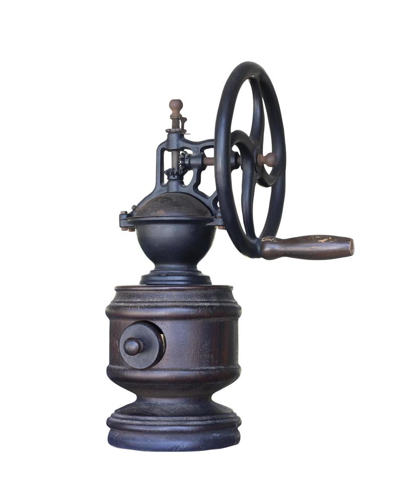 Wooden mechanical coffee grinder isolated on white background.Clipping path photo