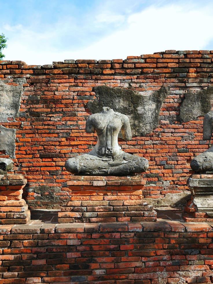 Headless buddha statue in Ayutthaya ruins temple heritage site photo