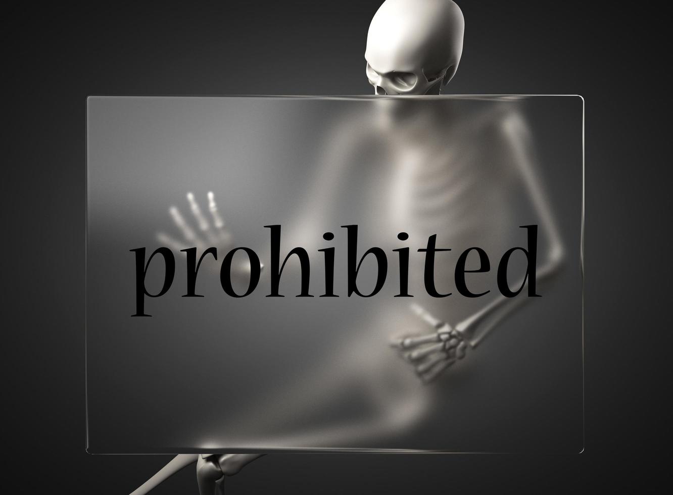 palabra prohibida en vidrio y esqueleto foto