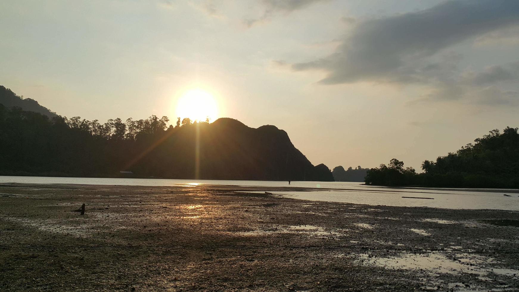 the sea at low tide in the afternoon photo