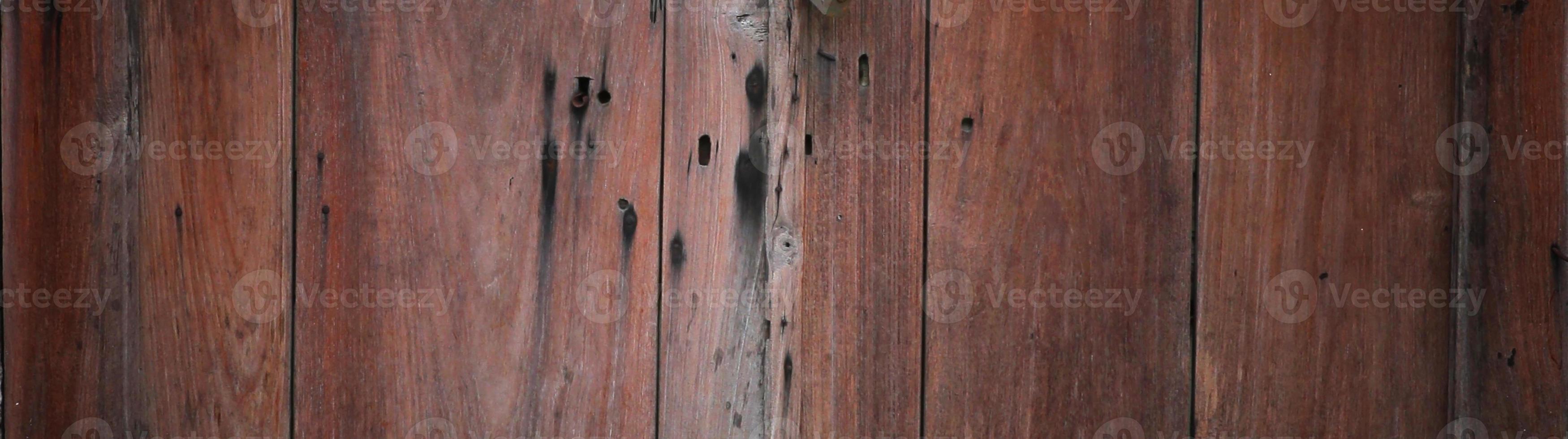 Fondo panorámico de madera con textura grunge. superficie de textura de fondo de madera. fondo de tablones de madera foto