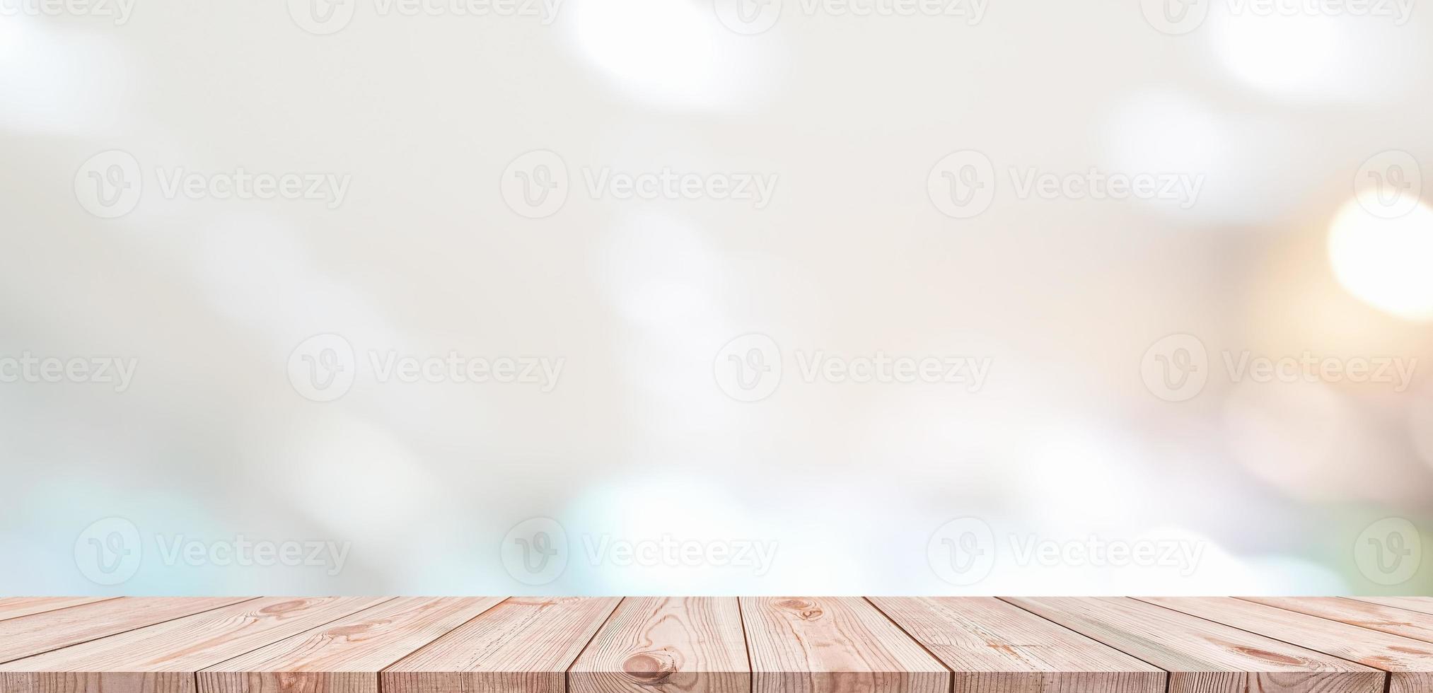 Wood table top and blur glass window For montage product display photo
