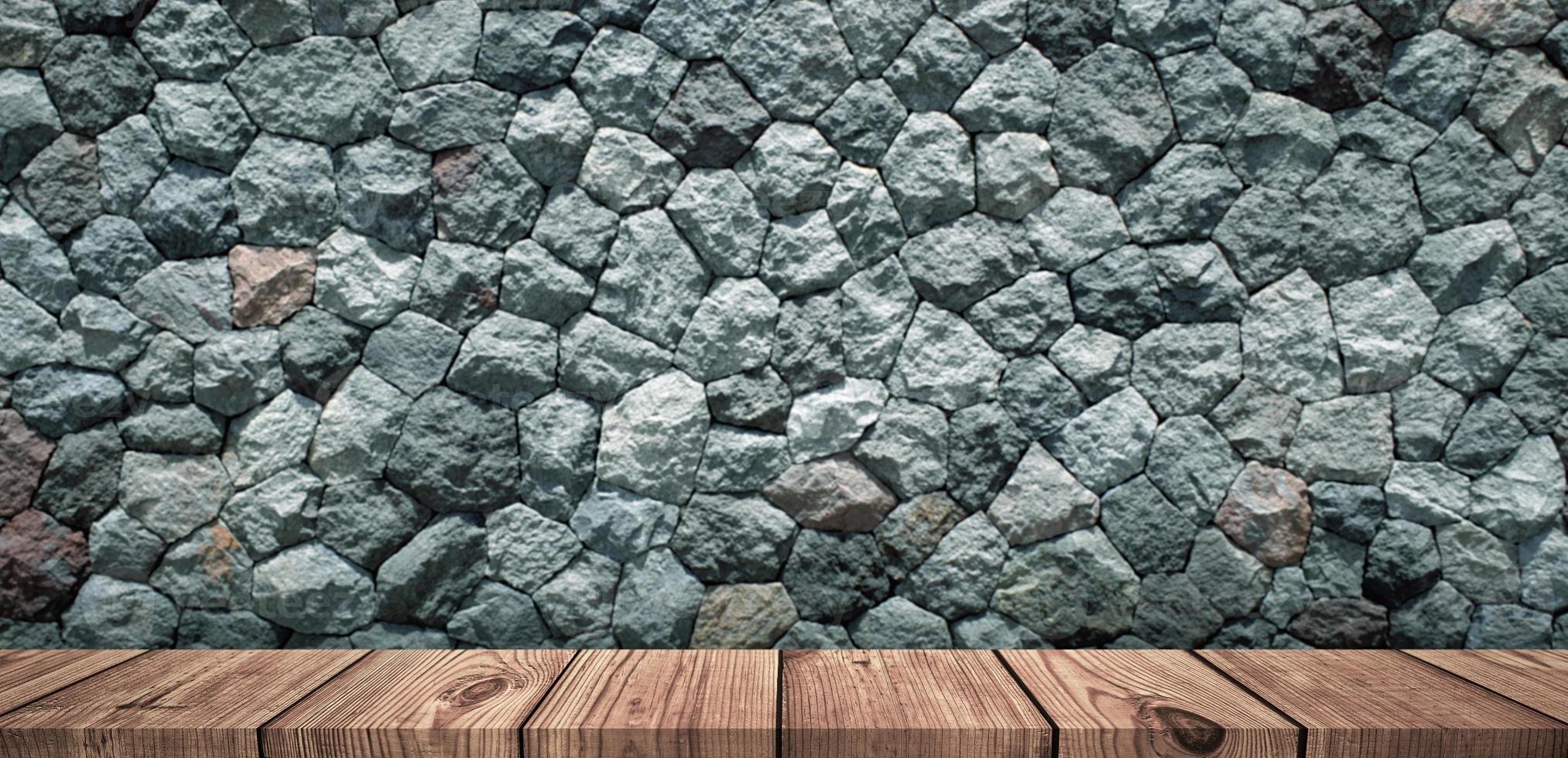 Empty light wood table top with stone wall blurred background photo