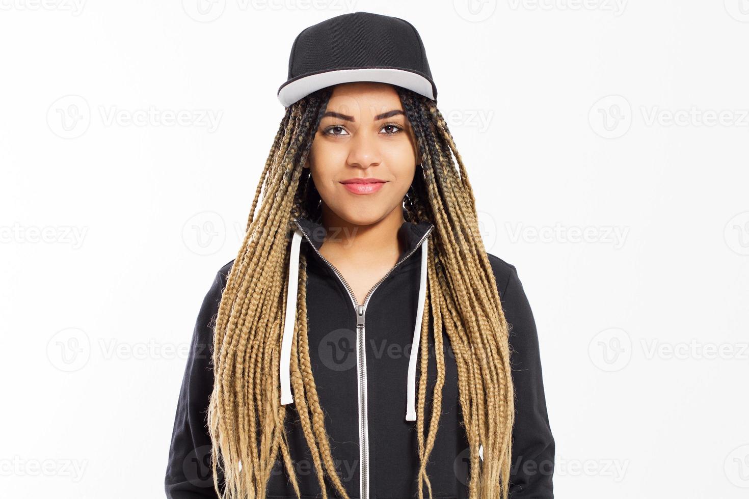 portrait young female hipster with cap and dreadlocks isolated on white background photo