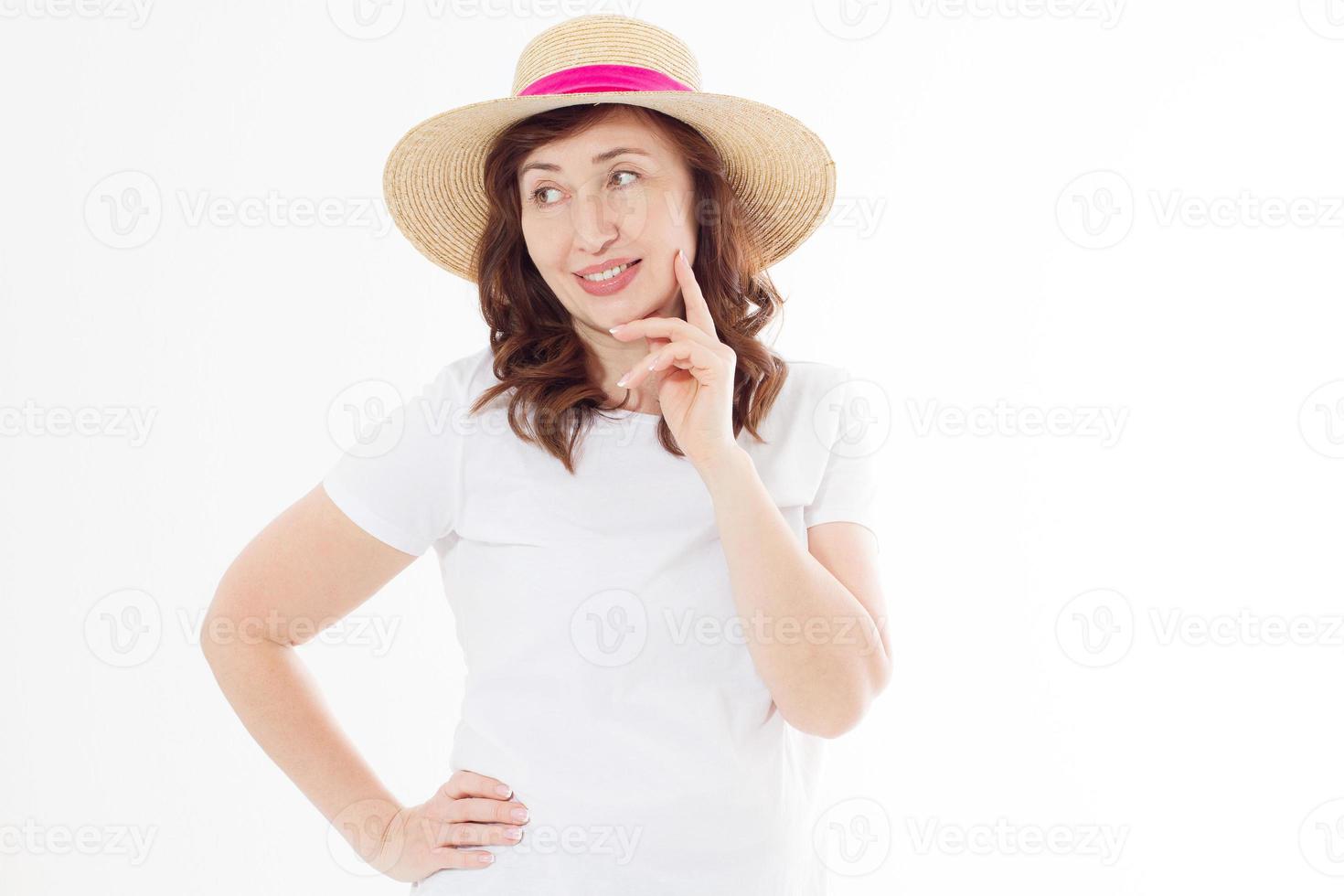 Summer beach holiday, vacation concept. Woman in hat and template blank t shirt isolated on white background. Copy space on tshirt and place for print. Sun skin care, wrinkles protection. Anti aging photo