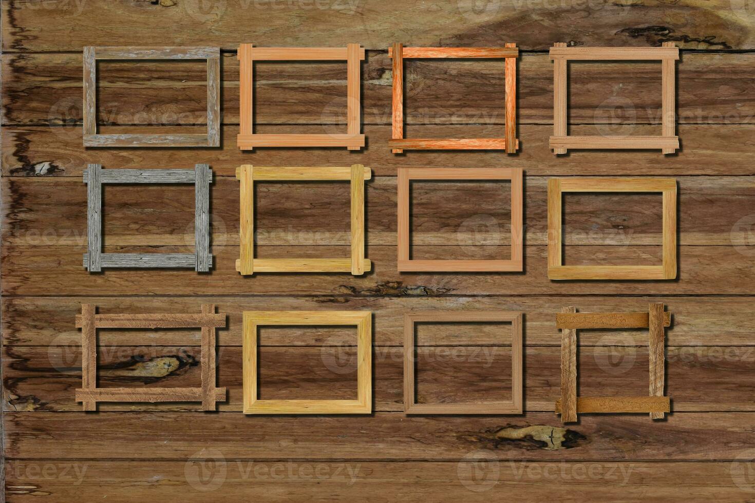 Vintage photo frames on wood wall for interior or background.