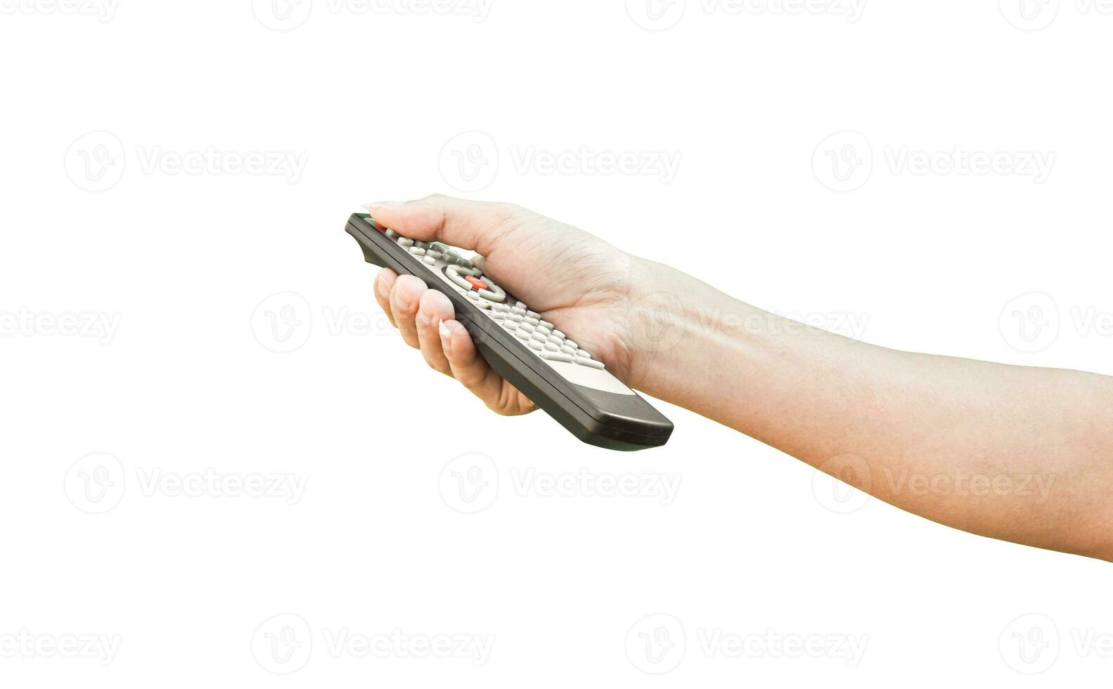 Hand holding television remote control, isolated on white background with clipping path. photo