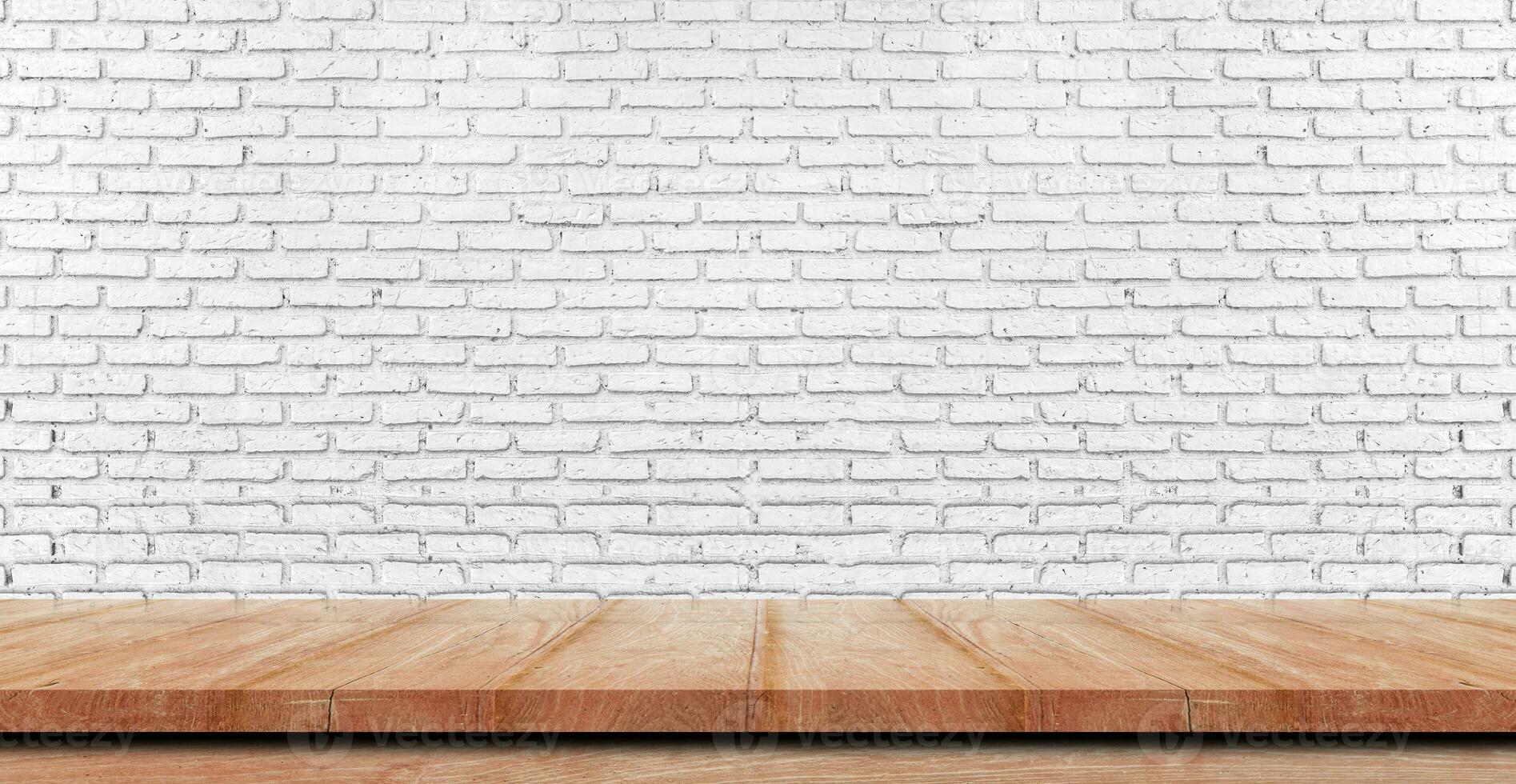 Empty wooden table top, counter or shelf on white brick wall background, For food display banner, backdrop. photo