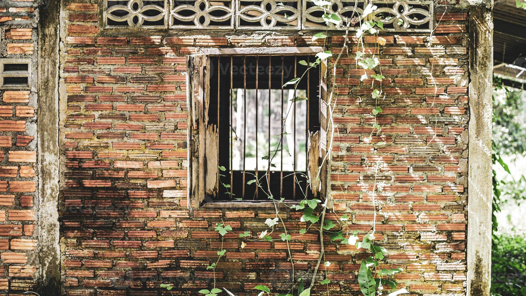 Window of an old abandoned house. Scary. Scary place concept. photo