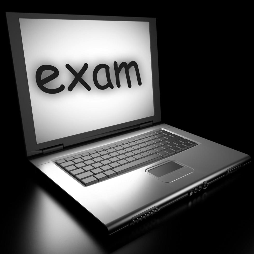 exam word on laptop photo