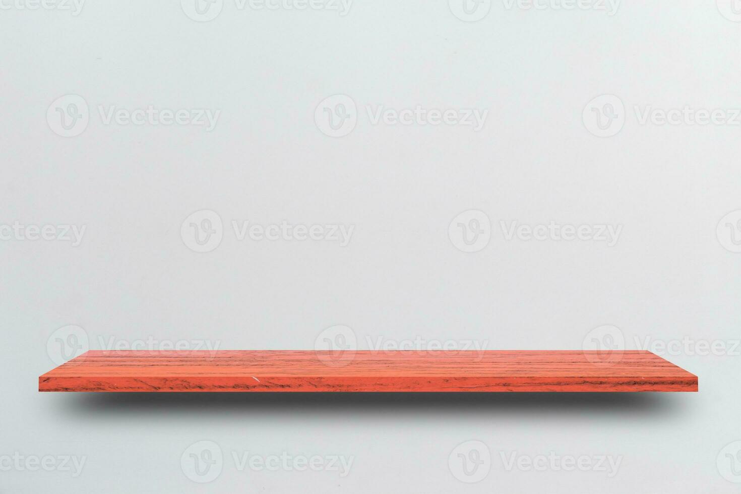 Front view empty wooden shelf and grey wall. Design concept photo
