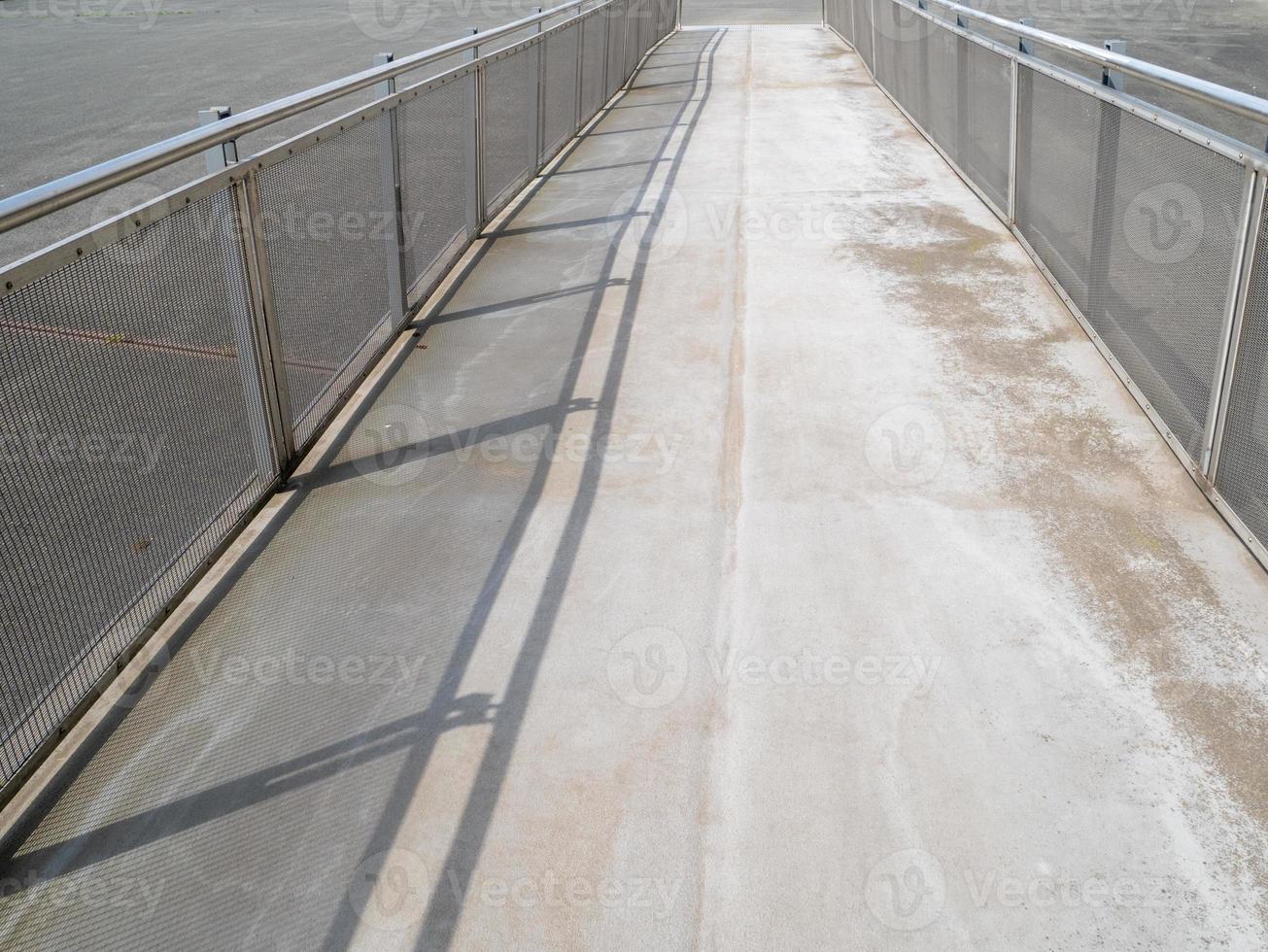 ramp with railing for pedestrians, baby carriages, disabled people photo