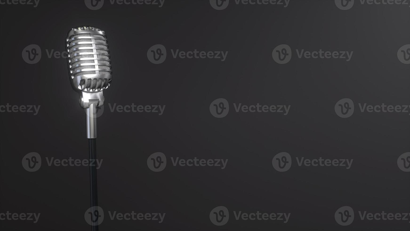 Silver retro microphone on black background photo