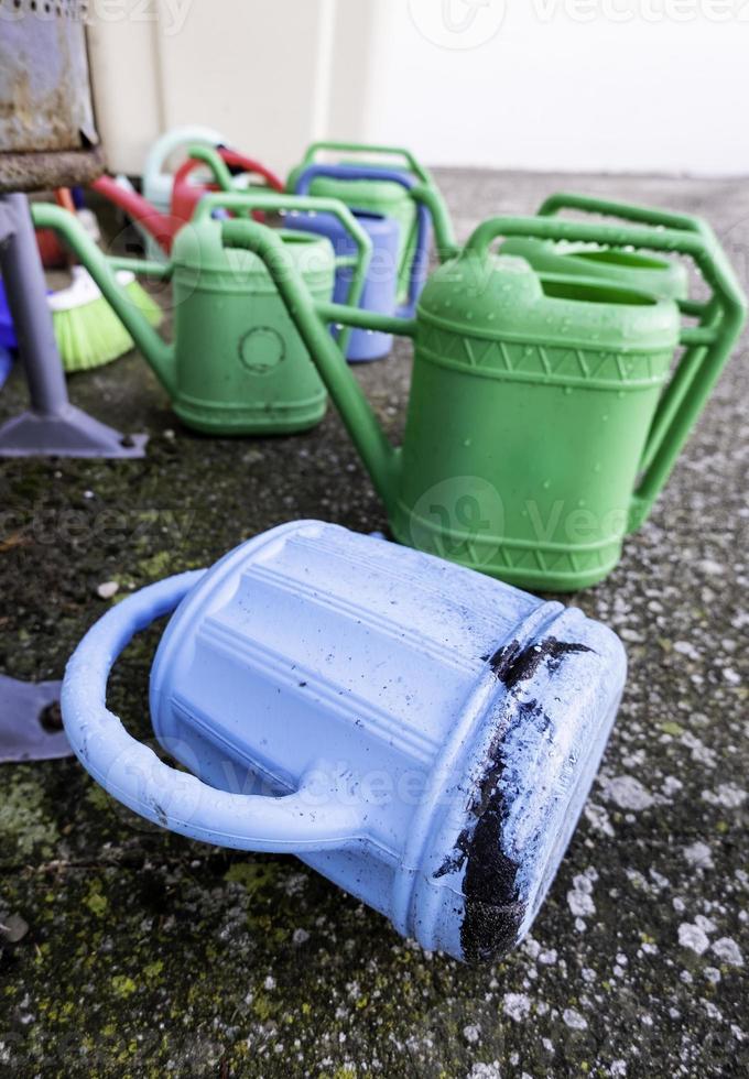 Plastic watering cans 7643179 Stock Photo at Vecteezy