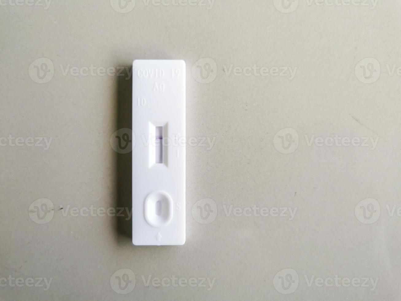 ATK test for Covid-19 on a white background, one line shows no infection photo