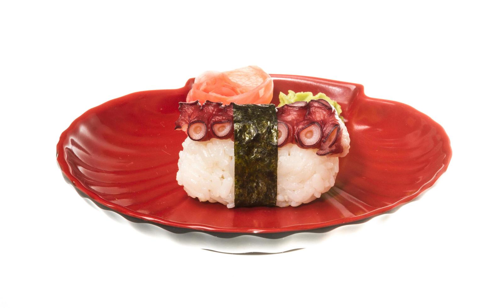 Japanese sushi with meat octopus on a white background photo