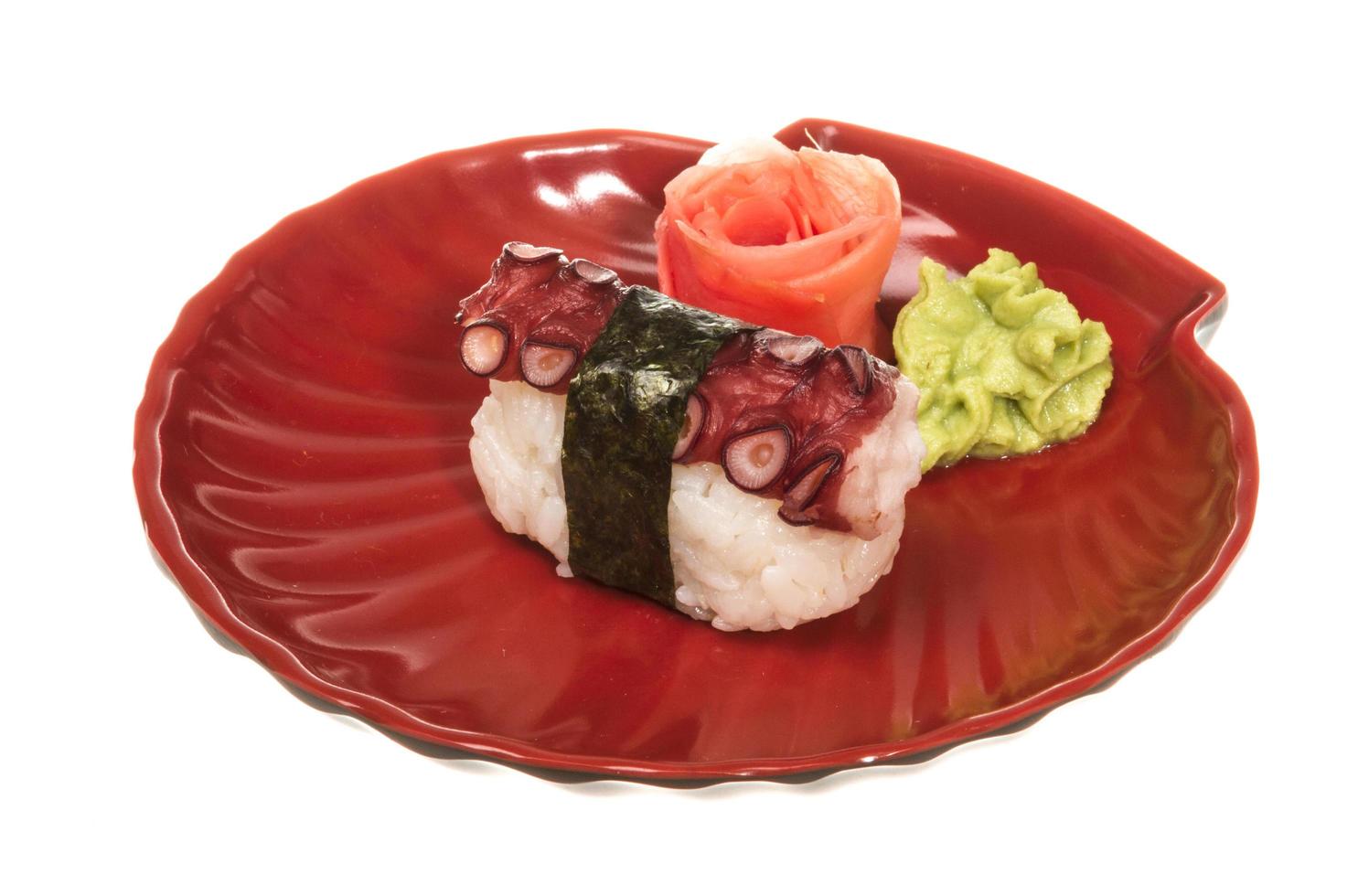 Japanese sushi with meat octopus on a white background photo