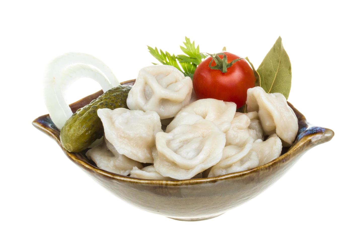 Bowl with traditional russian dish - pelmeni photo