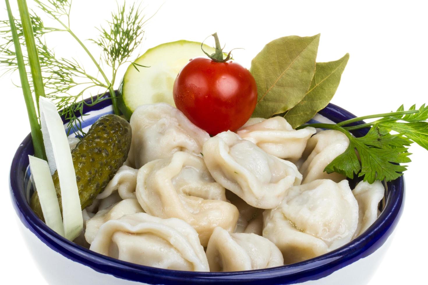 Bowl with traditional russian dish - pelmeni photo