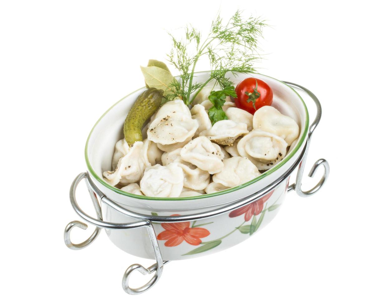 Bowl with traditional russian dish - pelmeni photo