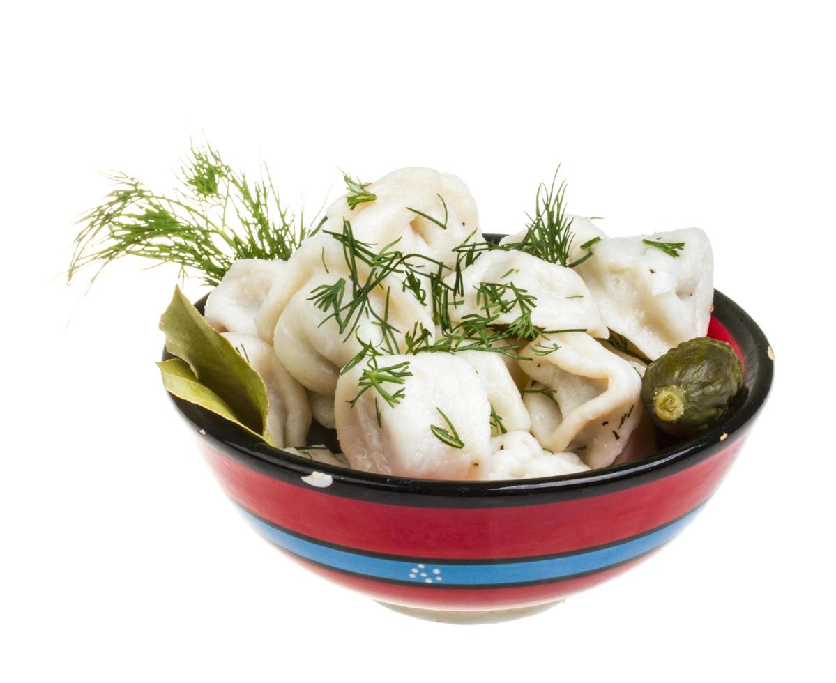 Bowl with traditional russian dish - pelmeni photo