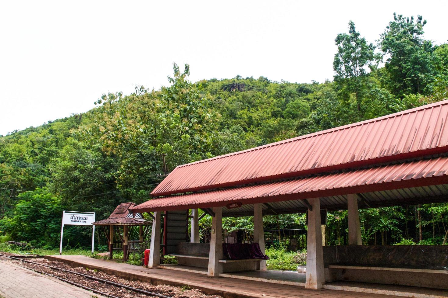 Railway on the mountain and the river in Thailand photo