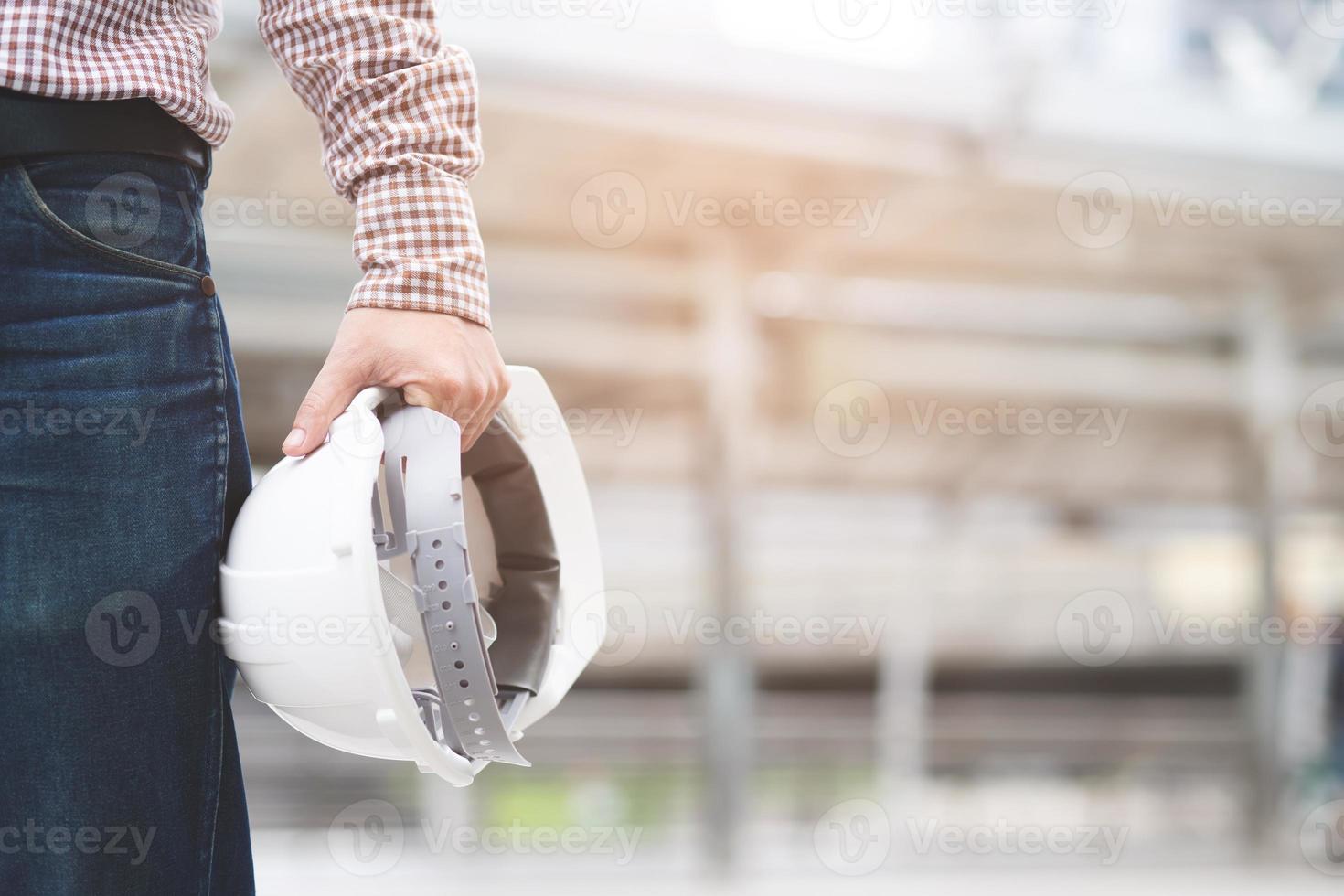 The image of engineer with safety helmet. photo